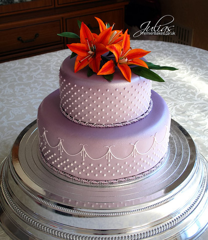 Elegant Wedding cake ..suited the occasion perfectly.  Two tier Chocolate cake with chocolate buttercream filling
